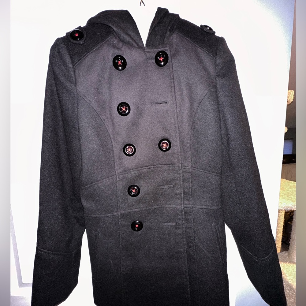 Barely worn pea coat. Size xs. Black with red stitching & hood.